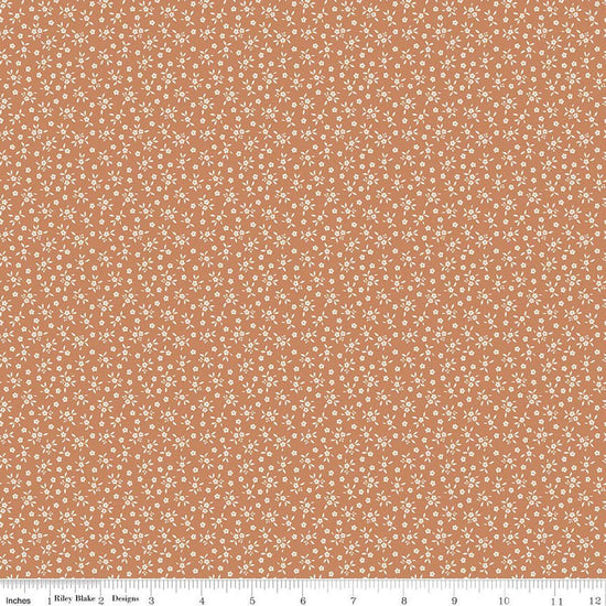 Image of Worth Repeating Ditsy Fresco quilting cotton fabric by Sandy Gervais for Riley Blake Designs. Features flowers on an orange background. Cute Little Fabric Shop.