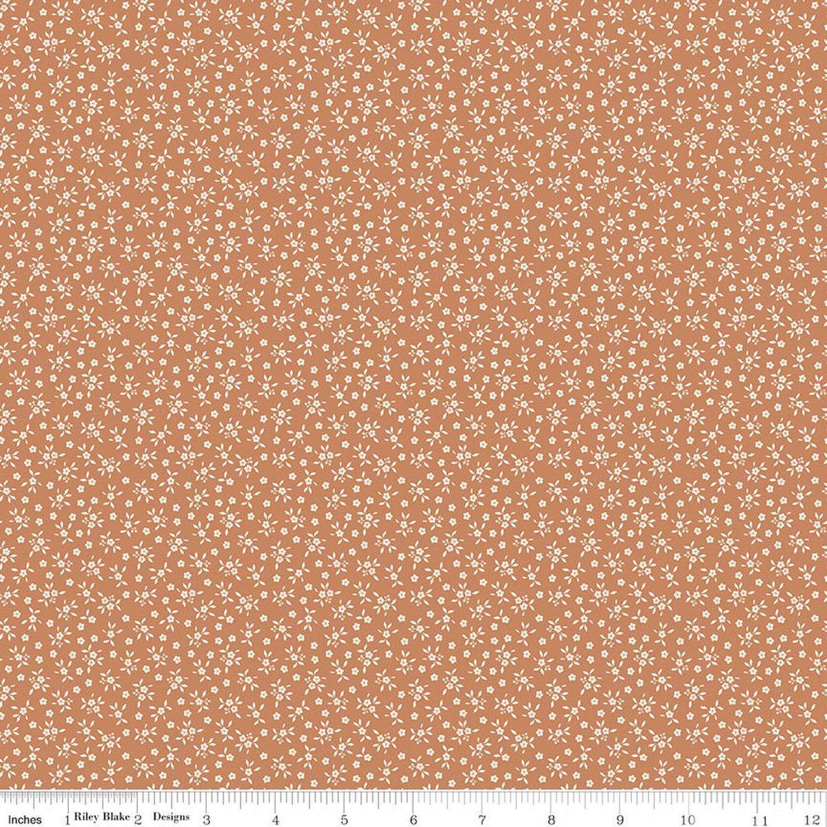 Image of Worth Repeating Ditsy Fresco quilting cotton fabric by Sandy Gervais for Riley Blake Designs. Features flowers on an orange background. Cute Little Fabric Shop.
