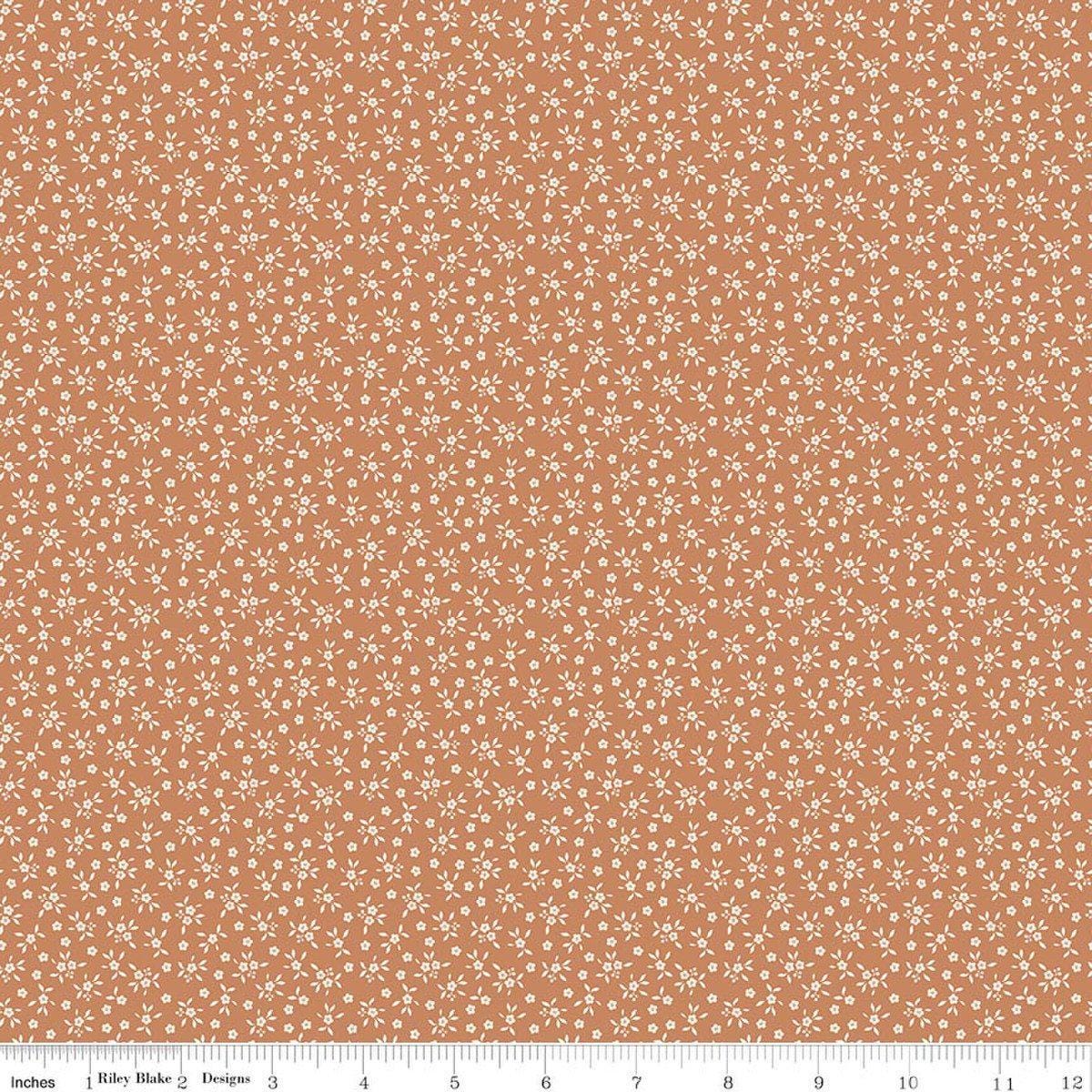 Image of Worth Repeating Ditsy Fresco quilting cotton fabric by Sandy Gervais for Riley Blake Designs. Features flowers on an orange background. Cute Little Fabric Shop.