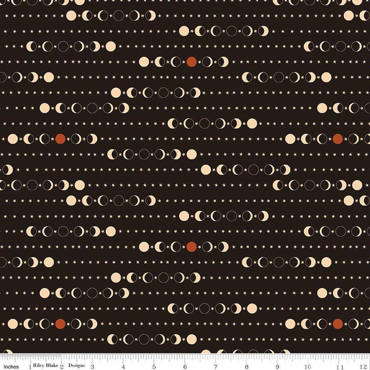 Image of Secret Garden Moon Phases Black quilting cotton fabric by Amanda Castor for Riley Blake Designs. Features moons on a black background. Cute Little Fabric Shop.