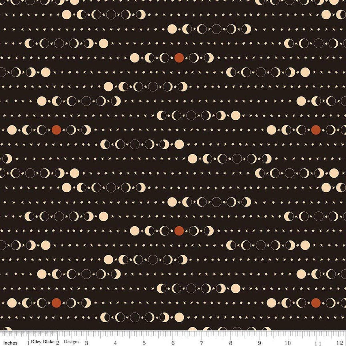 Image of Secret Garden Moon Phases Black quilting cotton fabric by Amanda Castor for Riley Blake Designs. Features moons on a black background. Cute Little Fabric Shop.