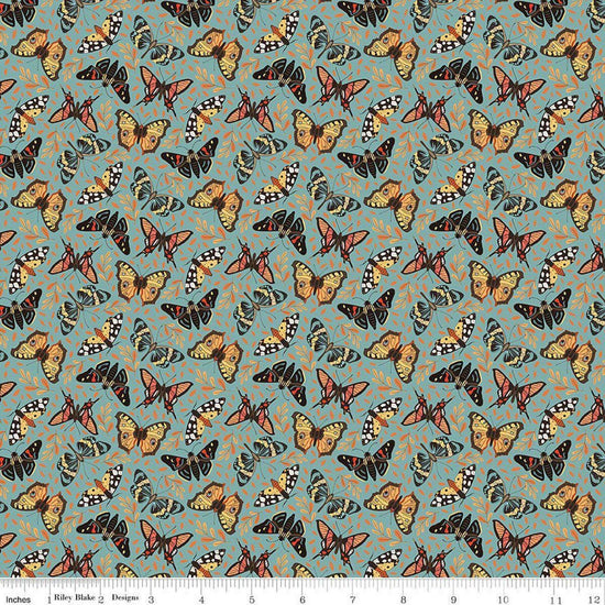 Image of Secret Garden Moths Wedgewood quilting cotton fabric by Amanda Castor for Riley Blake Designs. Features bugs on a blue background. Cute Little Fabric Shop.