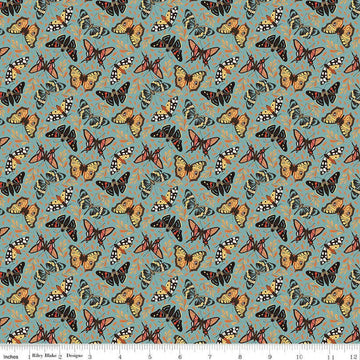 Image of Secret Garden Moths Wedgewood quilting cotton fabric by Amanda Castor for Riley Blake Designs. Features bugs on a blue background. Cute Little Fabric Shop.