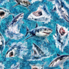 Image of Into the Deep Great Whites Turquoise quilting cotton fabric by Morris Creative Group for QT Fabrics. Features sharks on a blue background. Cute Little Fabric Shop.