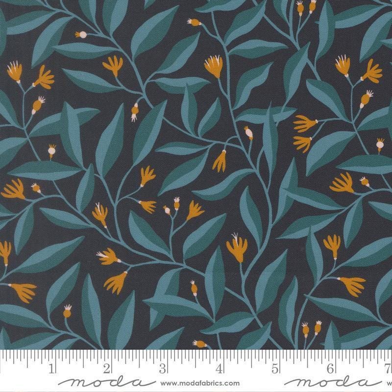 Image of Feather and Forest Bloom Foliage Midnight quilting cotton fabric by Linn Warme for Moda Fabrics. Features leaves and flowers on a blue background. Cute Little Fabric Shop.