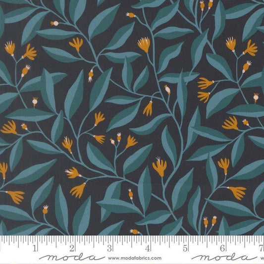 Image of Feather and Forest Bloom Foliage Midnight quilting cotton fabric by Linn Warme for Moda Fabrics. Features leaves and flowers on a blue background. Cute Little Fabric Shop.