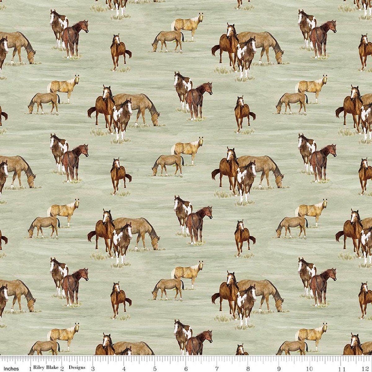 Image of The Homestead Horses Green quilting cotton fabric by Tara Reed for Riley Blake Designs. Features horses on a green background. Cute Little Fabric Shop.
