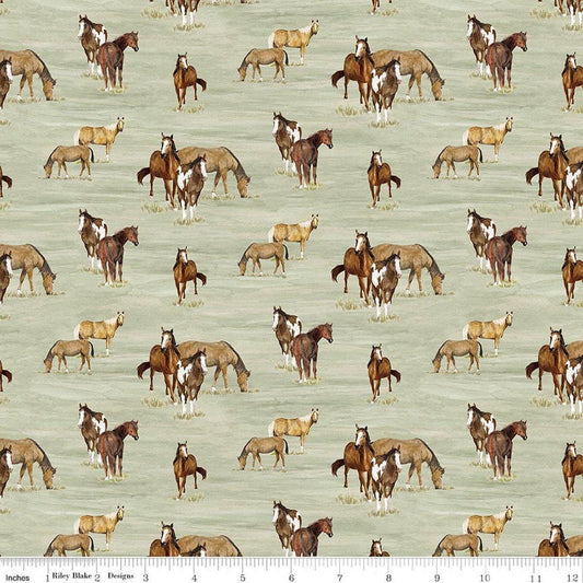Image of The Homestead Horses Green quilting cotton fabric by Tara Reed for Riley Blake Designs. Features horses on a green background. Cute Little Fabric Shop.