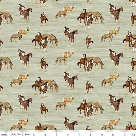 Image of The Homestead Horses Green quilting cotton fabric by Tara Reed for Riley Blake Designs. Features horses on a green background. Cute Little Fabric Shop.