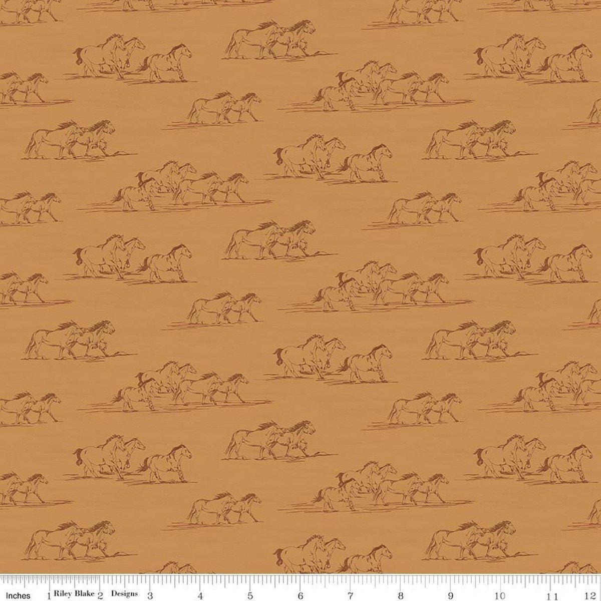 Image of The Homestead Horse Toile Ochre quilting cotton fabric by Tara Reed for Riley Blake Designs. Features horses on an orange background. Cute Little Fabric Shop.
