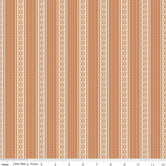 Image of Harvest on the Prairie Stripe Suede quilting cotton fabric by Modern Prairie for Riley Blake Designs. Features stripes on an orange background. Cute Little Fabric Shop.
