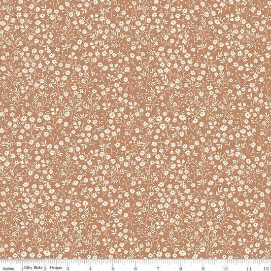 Image of Harvest on the Prairie Ditsy Suede quilting cotton fabric by Modern Prairie for Riley Blake Designs. Features flowers on a brown background. Cute Little Fabric Shop.