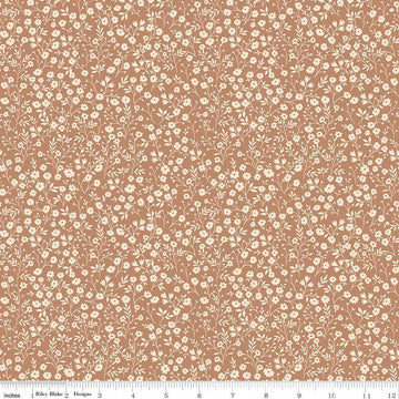 Image of Harvest on the Prairie Ditsy Suede quilting cotton fabric by Modern Prairie for Riley Blake Designs. Features flowers on a brown background. Cute Little Fabric Shop.