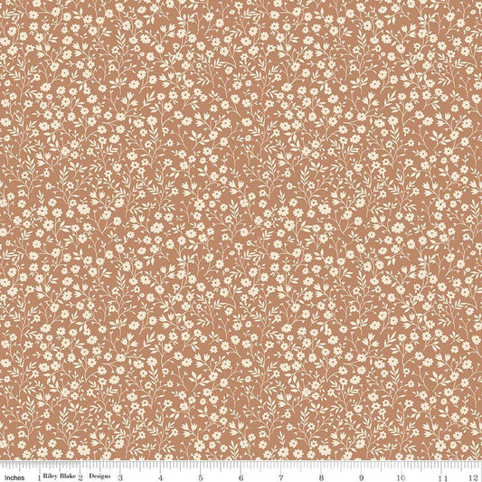 Image of Harvest on the Prairie Ditsy Suede quilting cotton fabric by Modern Prairie for Riley Blake Designs. Features flowers on a brown background. Cute Little Fabric Shop.