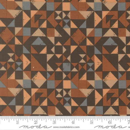 Image of Wellspring Quilted Blocked Charcoal quilting cotton fabric by Fancy That Design House for Moda Fabrics. Features a geometric pattern on a brown background. Cute Little Fabric Shop.