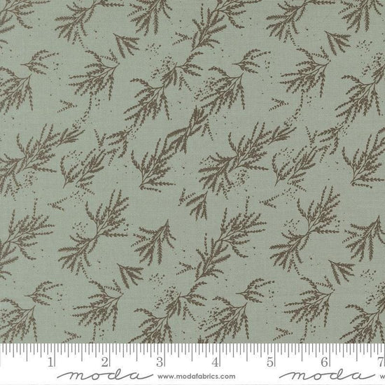 Image of Wellspring Branches Storm quilting cotton fabric by Fancy That Design House for Moda Fabrics. Features leaves on a blue background. Cute Little Fabric Shop.