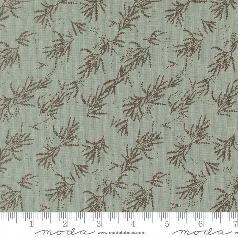 Image of Wellspring Branches Storm quilting cotton fabric by Fancy That Design House for Moda Fabrics. Features leaves on a blue background. Cute Little Fabric Shop.