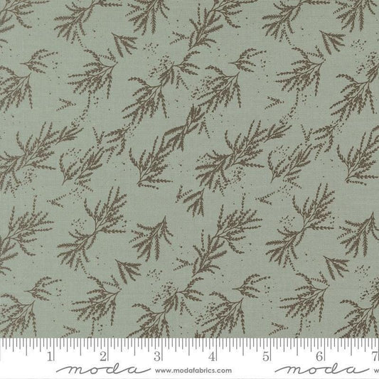 Image of Wellspring Branches Storm quilting cotton fabric by Fancy That Design House for Moda Fabrics. Features leaves on a blue background. Cute Little Fabric Shop.