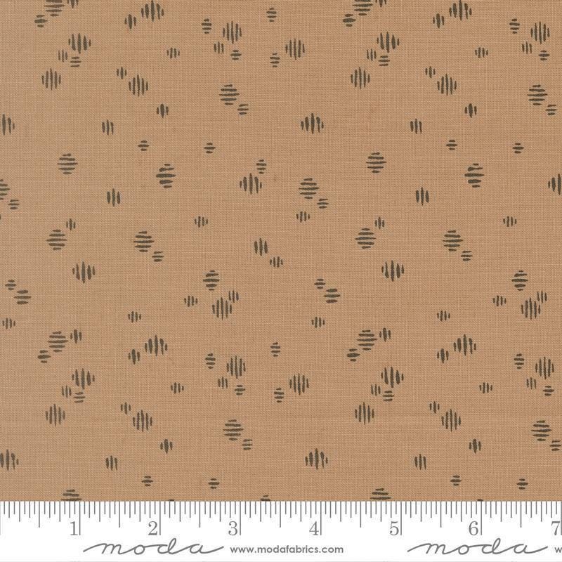 Image of Wellspring Dashed Mink quilting cotton fabric by Fancy That Design House for Moda Fabrics. Features dots on a brown background. Cute Little Fabric Shop.