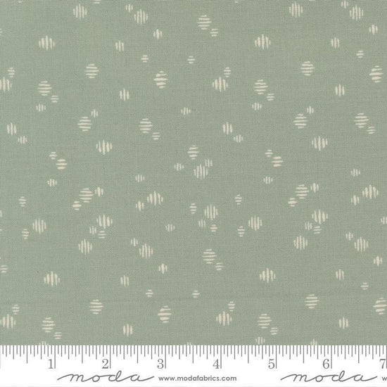 Image of Wellspring Dashed Storm quilting cotton fabric by Fancy That Design House for Moda Fabrics. Features dots on a blue background. Cute Little Fabric Shop.