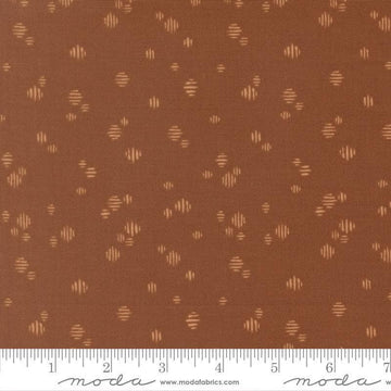 Image of Wellspring Dashed Dark Clay quilting cotton fabric by Fancy That Design House for Moda Fabrics. Features dots on a brown background. Cute Little Fabric Shop.