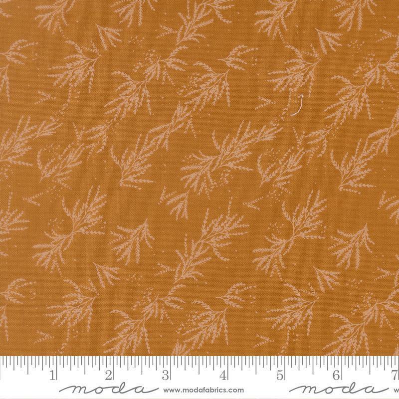 Image of Wellspring Branches Caramel quilting cotton fabric by Fancy That Design House for Moda Fabrics. Features leaves on a gold background. Cute Little Fabric Shop.