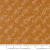 Image of Wellspring Branches Caramel quilting cotton fabric by Fancy That Design House for Moda Fabrics. Features leaves on a gold background. Cute Little Fabric Shop.