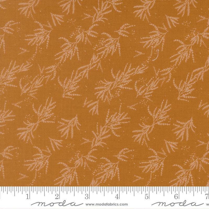 Image of Wellspring Branches Caramel quilting cotton fabric by Fancy That Design House for Moda Fabrics. Features leaves on a gold background. Cute Little Fabric Shop.