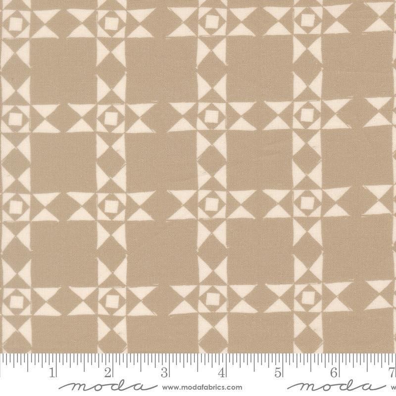 Image of Imprint Relics Stone quilting cotton fabric by Sewn By Amy Schelle for Moda Fabrics. Features a geometric pattern on a brown background. Cute Little Fabric Shop.