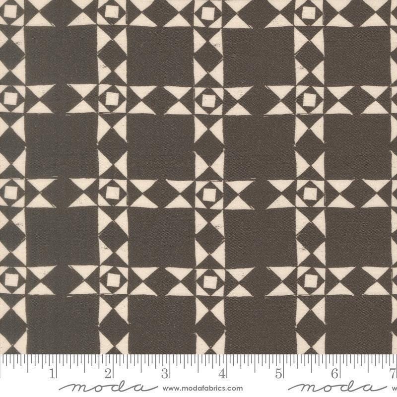 Image of Imprint Relics Iron quilting cotton fabric by Sewn By Amy Schelle for Moda Fabrics. Features a geometric pattern on a brown background. Cute Little Fabric Shop.