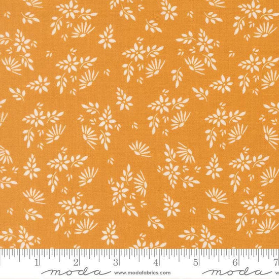 Image of Birch and Willow Flora Golden quilting cotton fabric by Sherri & Chelsi for Moda Fabrics. Features leaves on a gold background. Cute Little Fabric Shop.