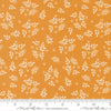 Image of Birch and Willow Flora Golden quilting cotton fabric by Sherri & Chelsi for Moda Fabrics. Features leaves on a gold background. Cute Little Fabric Shop.