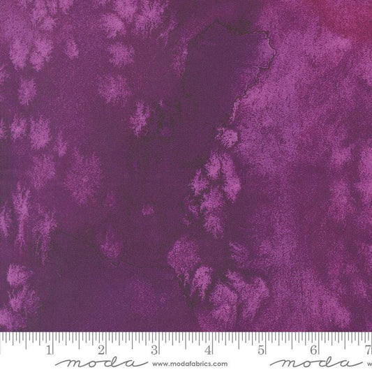 Image of Fleur The Love Flow Plum quilting cotton fabric by Create Joy Project for Moda Fabrics. Features printed watercolor texture on a purple background. Cute Little Fabric Shop.