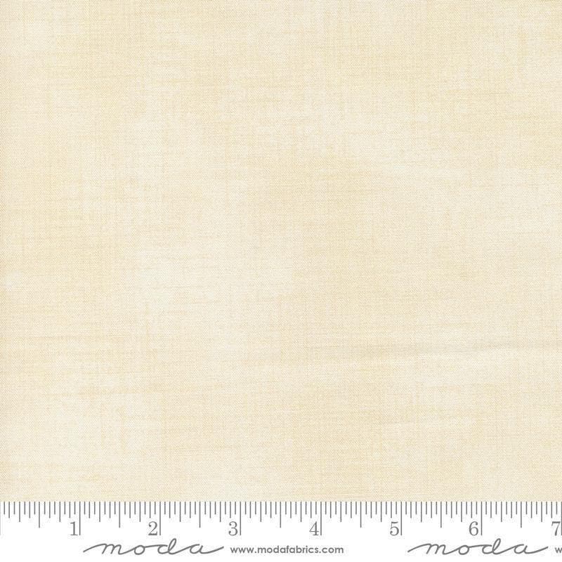 Image of Data Textured Solid Lovelace quilting cotton fabric by Janet Clare for Moda Fabrics. Features printed solid texture on a cream background. Cute Little Fabric Shop.