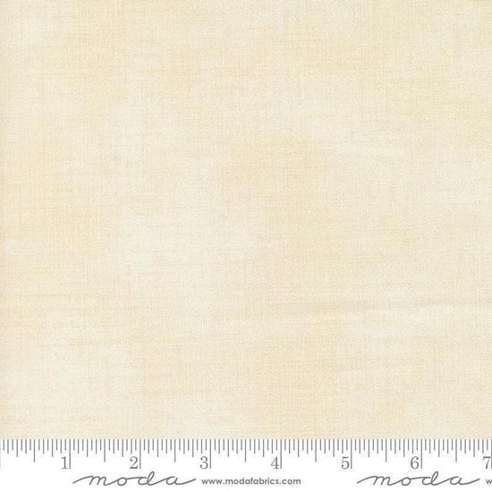 Image of Data Textured Solid Lovelace quilting cotton fabric by Janet Clare for Moda Fabrics. Features printed solid texture on a cream background. Cute Little Fabric Shop.