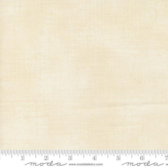 Image of Data Textured Solid Lovelace quilting cotton fabric by Janet Clare for Moda Fabrics. Features printed solid texture on a cream background. Cute Little Fabric Shop.