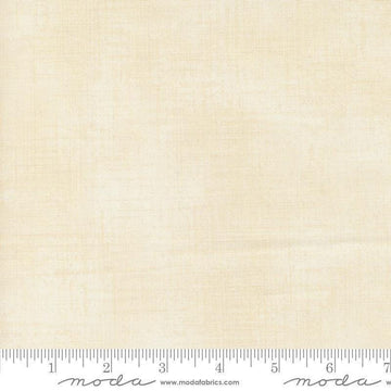 Image of Data Textured Solid Lovelace quilting cotton fabric by Janet Clare for Moda Fabrics. Features printed solid texture on a cream background. Cute Little Fabric Shop.