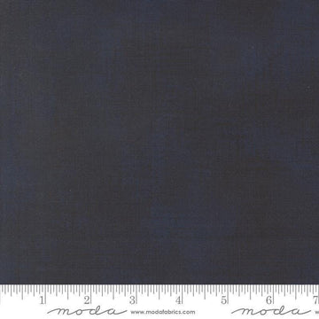 Image of Data Textured Solid Hawking quilting cotton fabric by Janet Clare for Moda Fabrics. Features printed solid texture on a blue background. Cute Little Fabric Shop.
