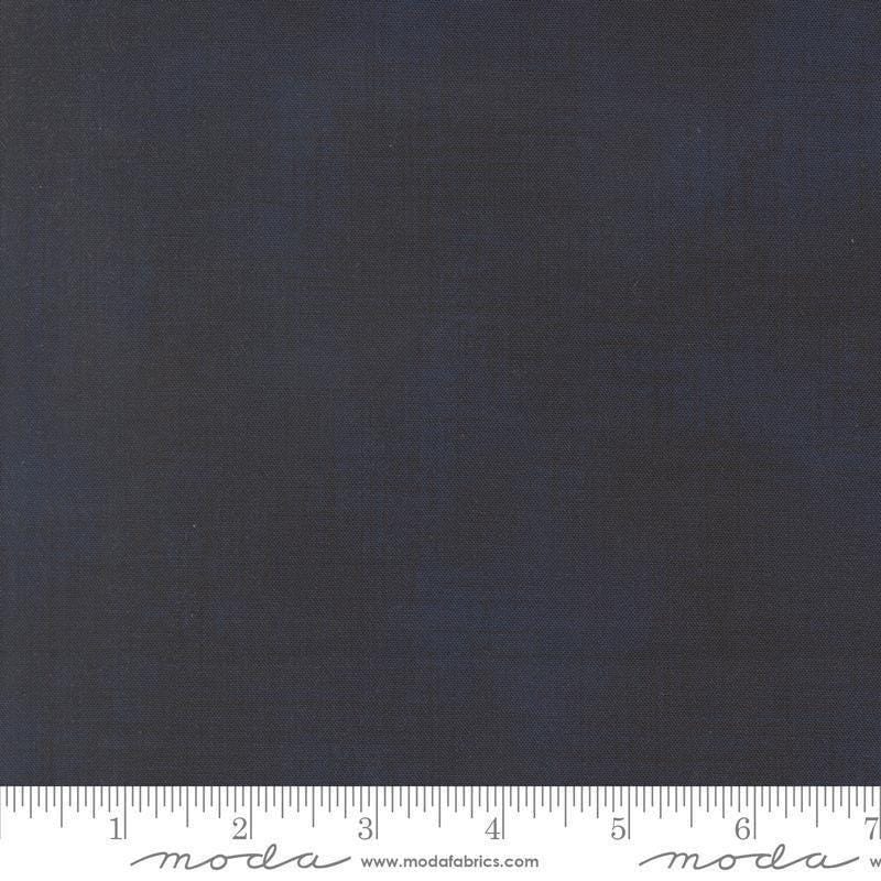 Image of Data Textured Solid Hawking quilting cotton fabric by Janet Clare for Moda Fabrics. Features printed solid texture on a blue background. Cute Little Fabric Shop.