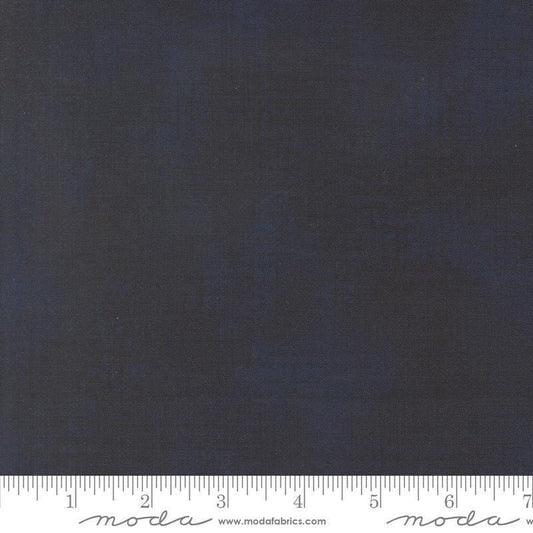 Image of Data Textured Solid Hawking quilting cotton fabric by Janet Clare for Moda Fabrics. Features printed solid texture on a blue background. Cute Little Fabric Shop.