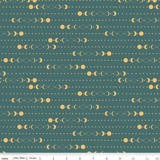 Image of Secret Garden Moon Phases Teal quilting cotton fabric by Amanda Castor for Riley Blake Designs. Features moons on a blue background. Cute Little Fabric Shop.