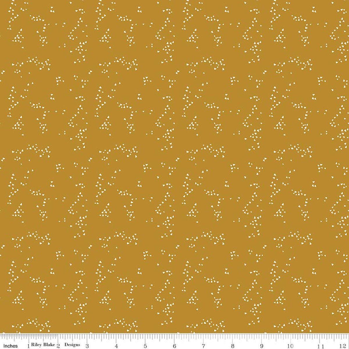 Image of Petals & Hazel Hearts Butterscotch quilting cotton fabric by Simple Simon & Company for Riley Blake Designs. Features hearts on a gold background. Cute Little Fabric Shop.
