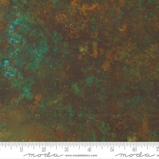 Image of Tranquil Patina Grounding Dark Teal quilting cotton fabric by Debbie Maddy for Moda Fabrics. Features printed texture on a blue and brown background. Cute Little Fabric Shop.