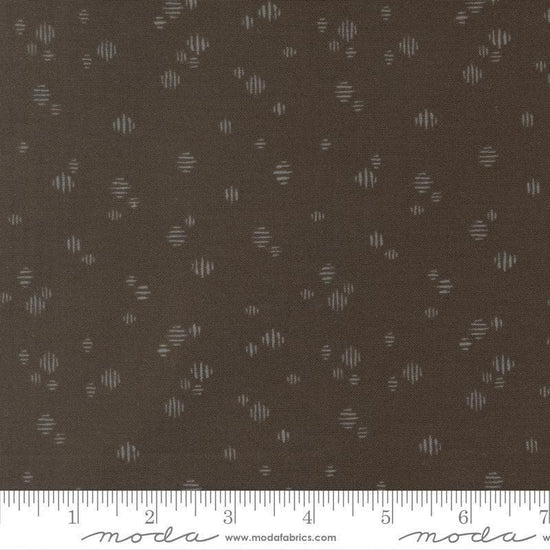Image of Wellspring Dashed Charcoal quilting cotton fabric by Fancy That Design House for Moda Fabrics. Features dots on a black background. Cute Little Fabric Shop.