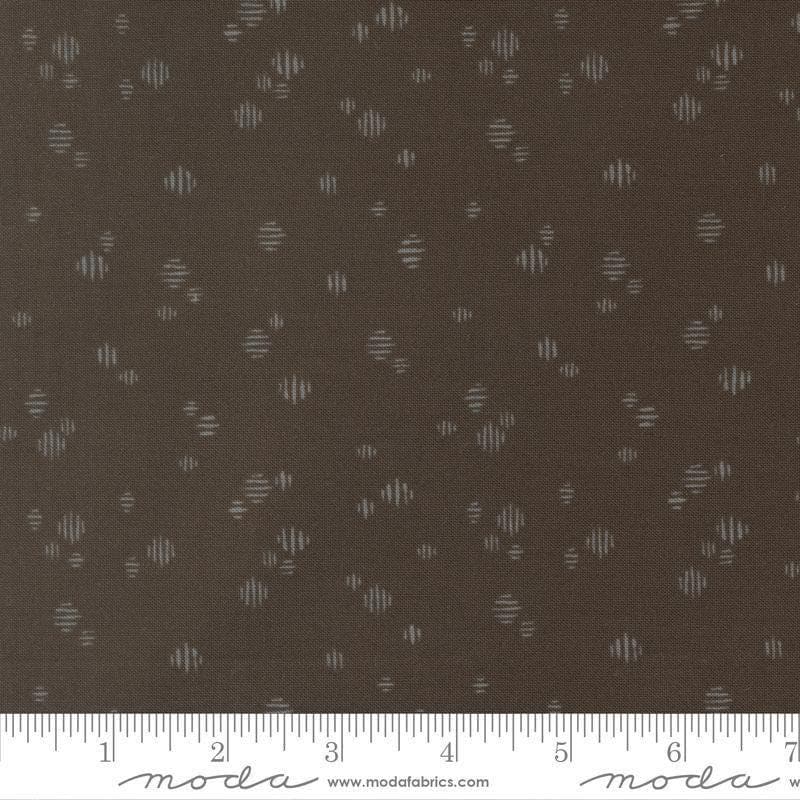 Image of Wellspring Dashed Charcoal quilting cotton fabric by Fancy That Design House for Moda Fabrics. Features dots on a black background. Cute Little Fabric Shop.