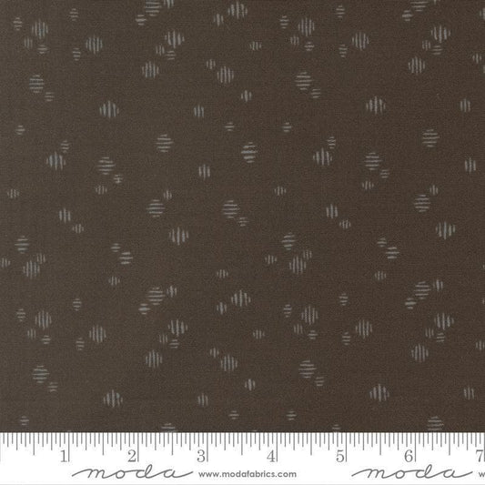 Image of Wellspring Dashed Charcoal quilting cotton fabric by Fancy That Design House for Moda Fabrics. Features dots on a black background. Cute Little Fabric Shop.