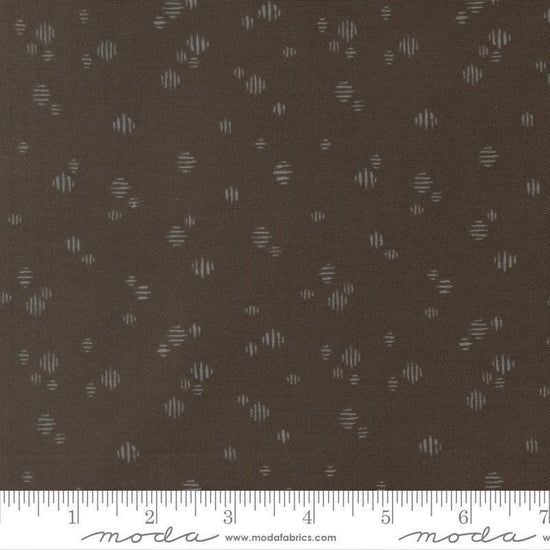 Image of Wellspring Dashed Charcoal quilting cotton fabric by Fancy That Design House for Moda Fabrics. Features dots on a black background. Cute Little Fabric Shop.