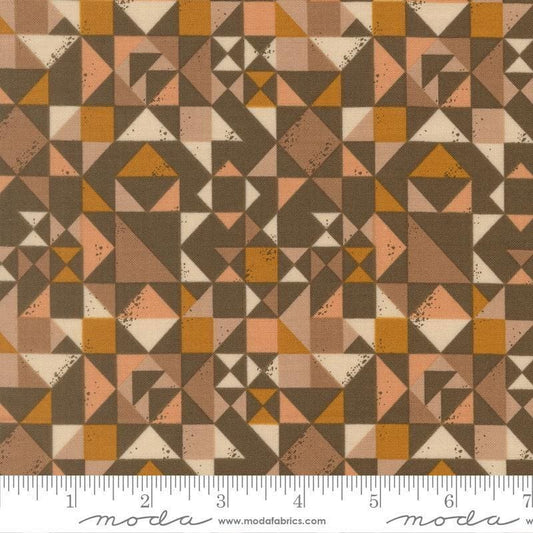 Image of Wellspring Quilt Blocked Earth quilting cotton fabric by Fancy That Design House for Moda Fabrics. Features a geometric pattern on a brown background. Cute Little Fabric Shop.