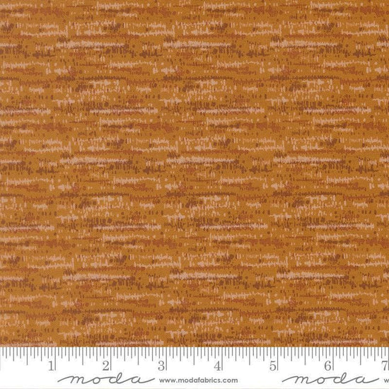 Image of Wellspring Blotted Caramel quilting cotton fabric by Fancy That Design House for Moda Fabrics. Features stripes on a brown background. Cute Little Fabric Shop.