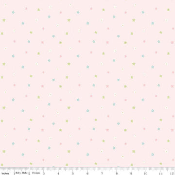 Image of Little Posies Ditsy Pink quilting cotton fabric by Cayla Naylor for Riley Blake Designs. Features stars on a pink background. Cute Little Fabric Shop.